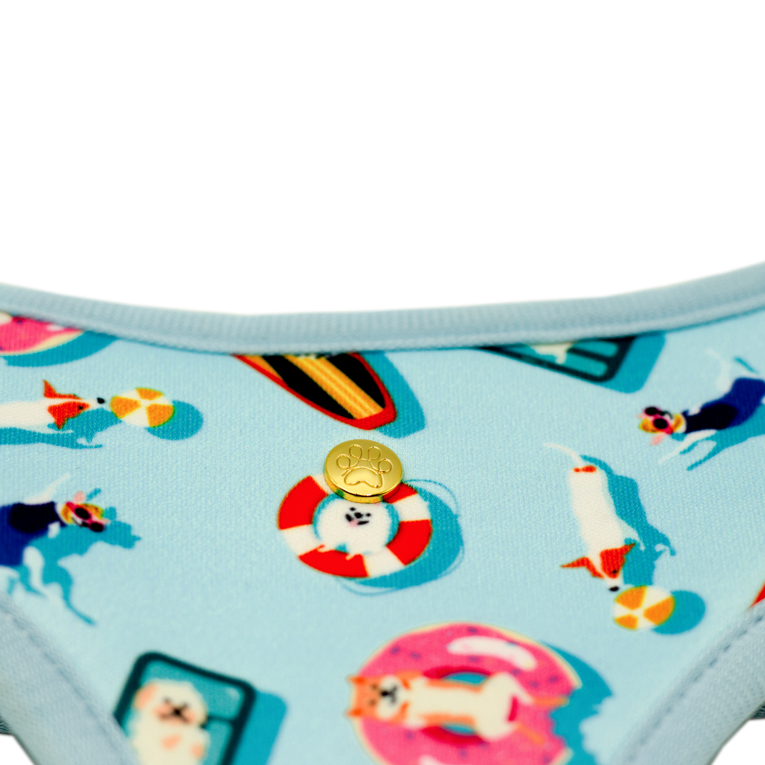 Pata Paw pool pups reversible harness showing a close-up of its golden paw.