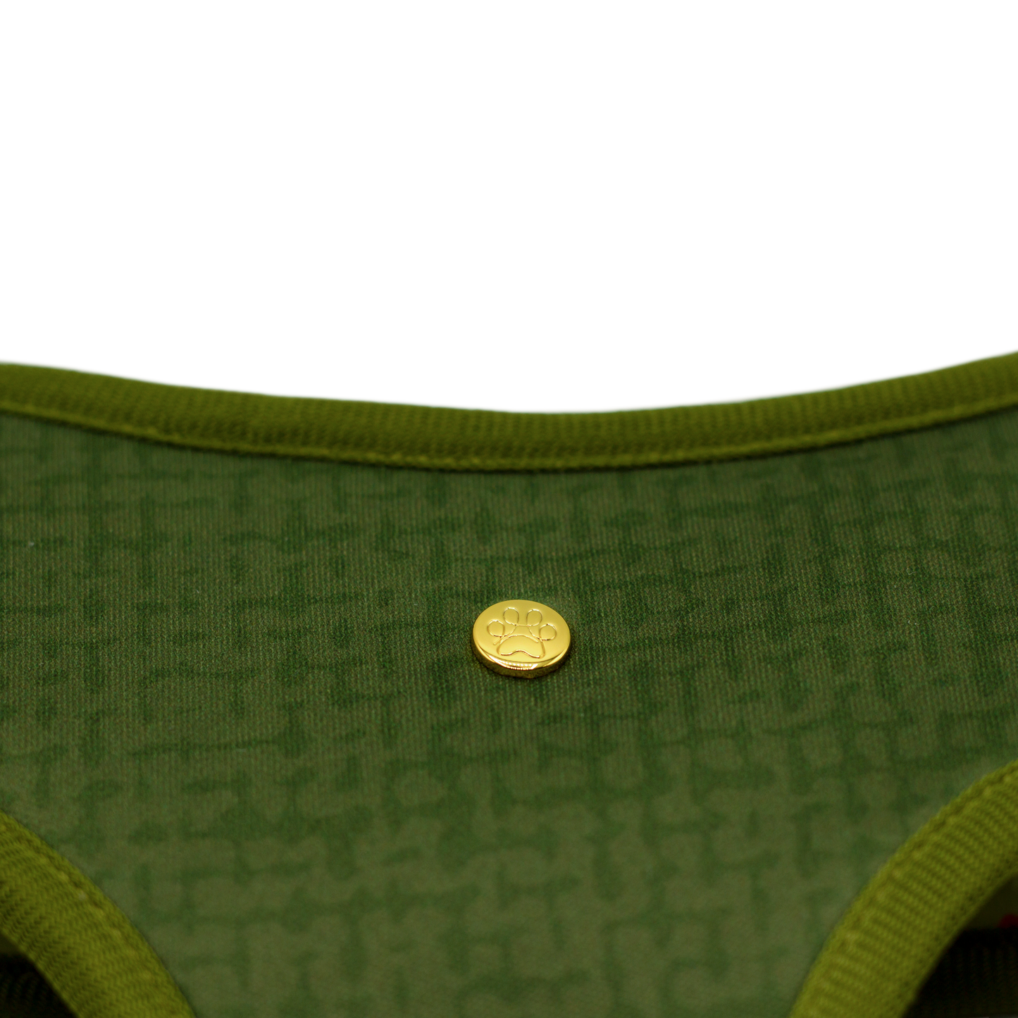 Pata Paw  alpine wildflowers reversible harness showing a close-up of its golden paw and a timeless and chic texture pattern in olive green.