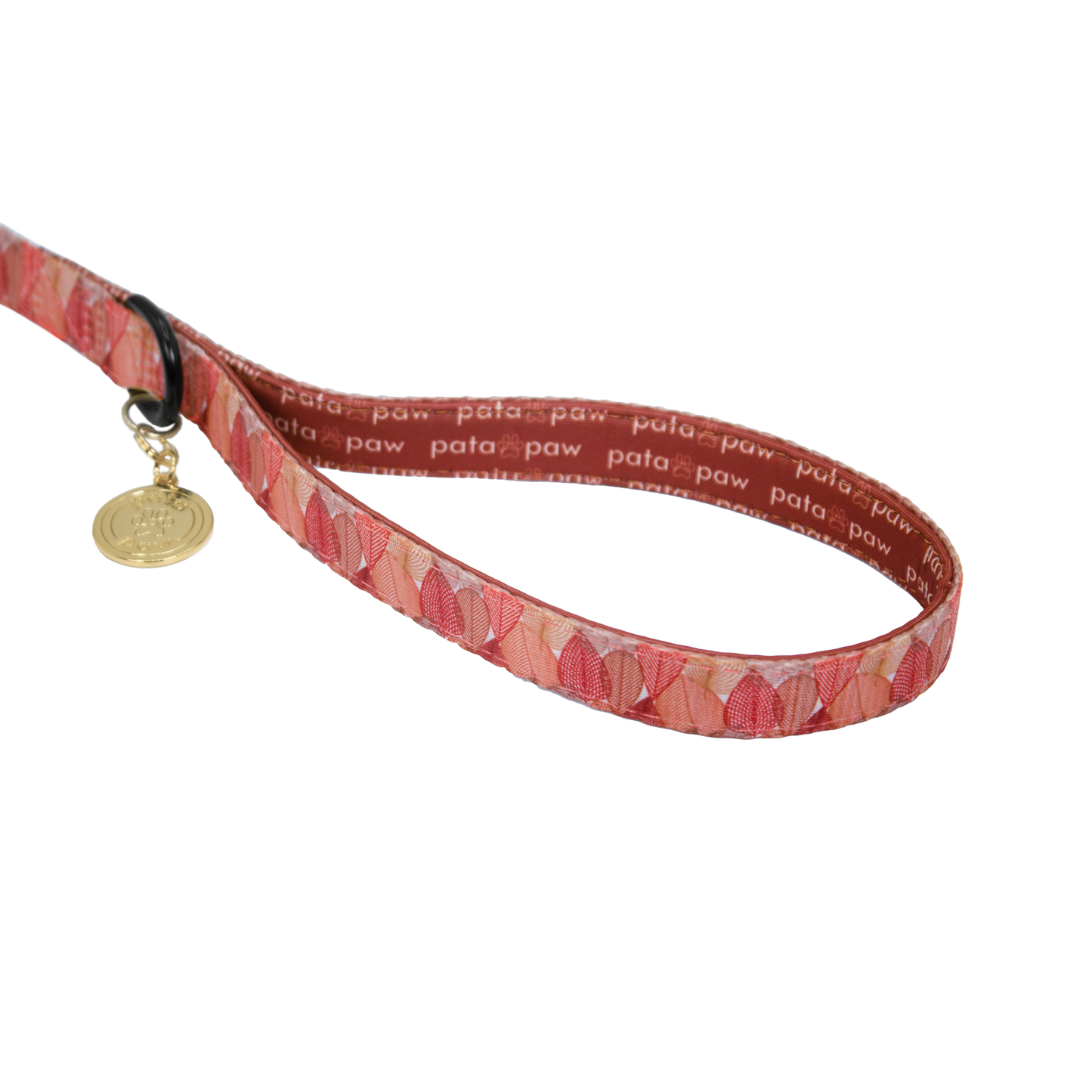 pata paw autumn crunch leash showing signature handle, metallic ring to attach a poop bag holder and golden paw medal