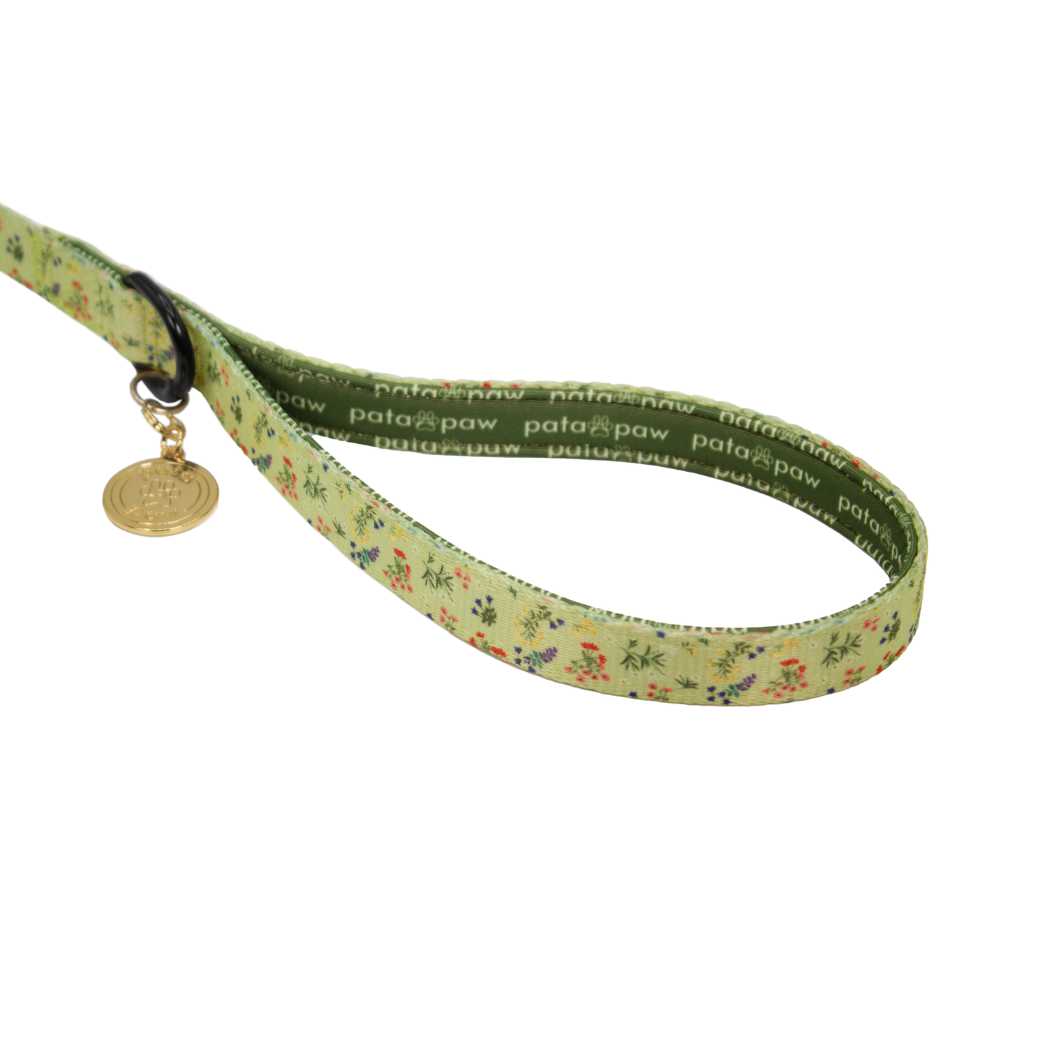 pata paw alpine wildflowers leash showing signature handle, metallic ring to attach a poop bag holder and golden paw medal